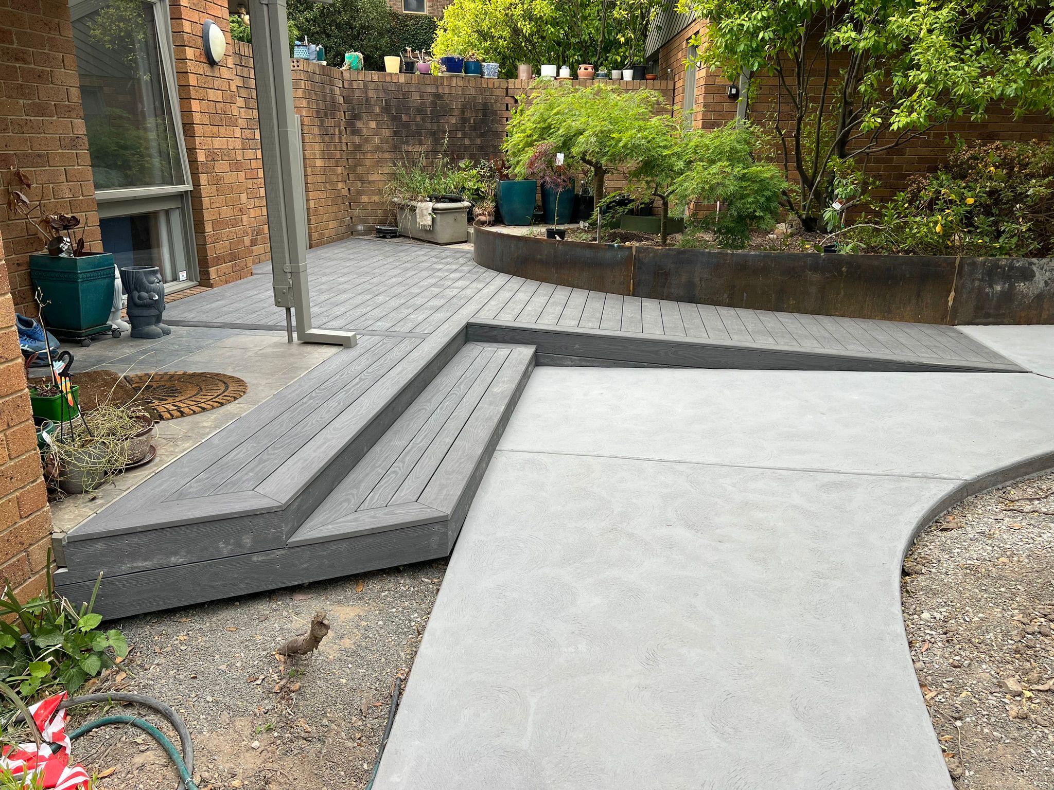 Composite Smoked Ash deck with integrated steps and ramp, Bruce Canberra