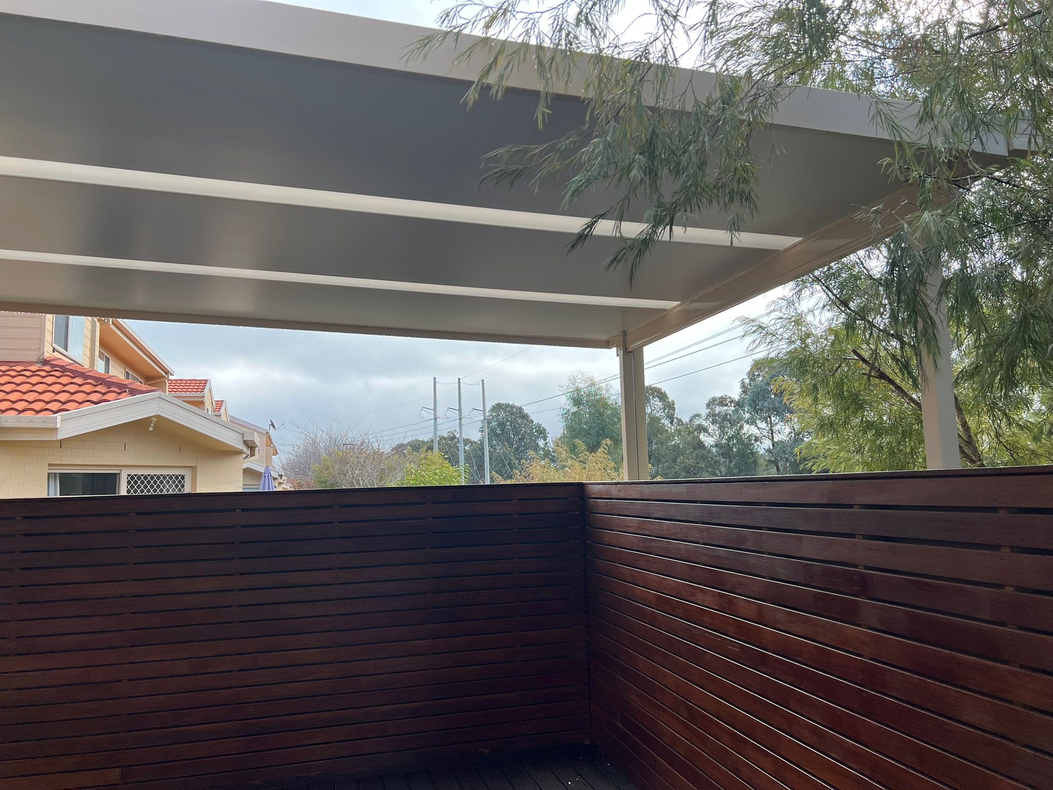 Flyover pergola with insulated roof panel and integrated skylights, Bruce Canberra