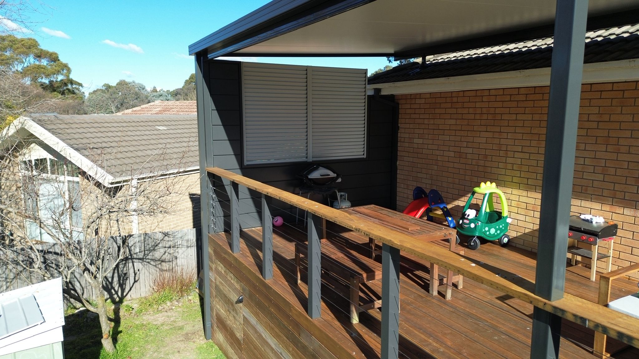 Dominion cladding adjoining Spotted Gum deck, Fisher Canberra