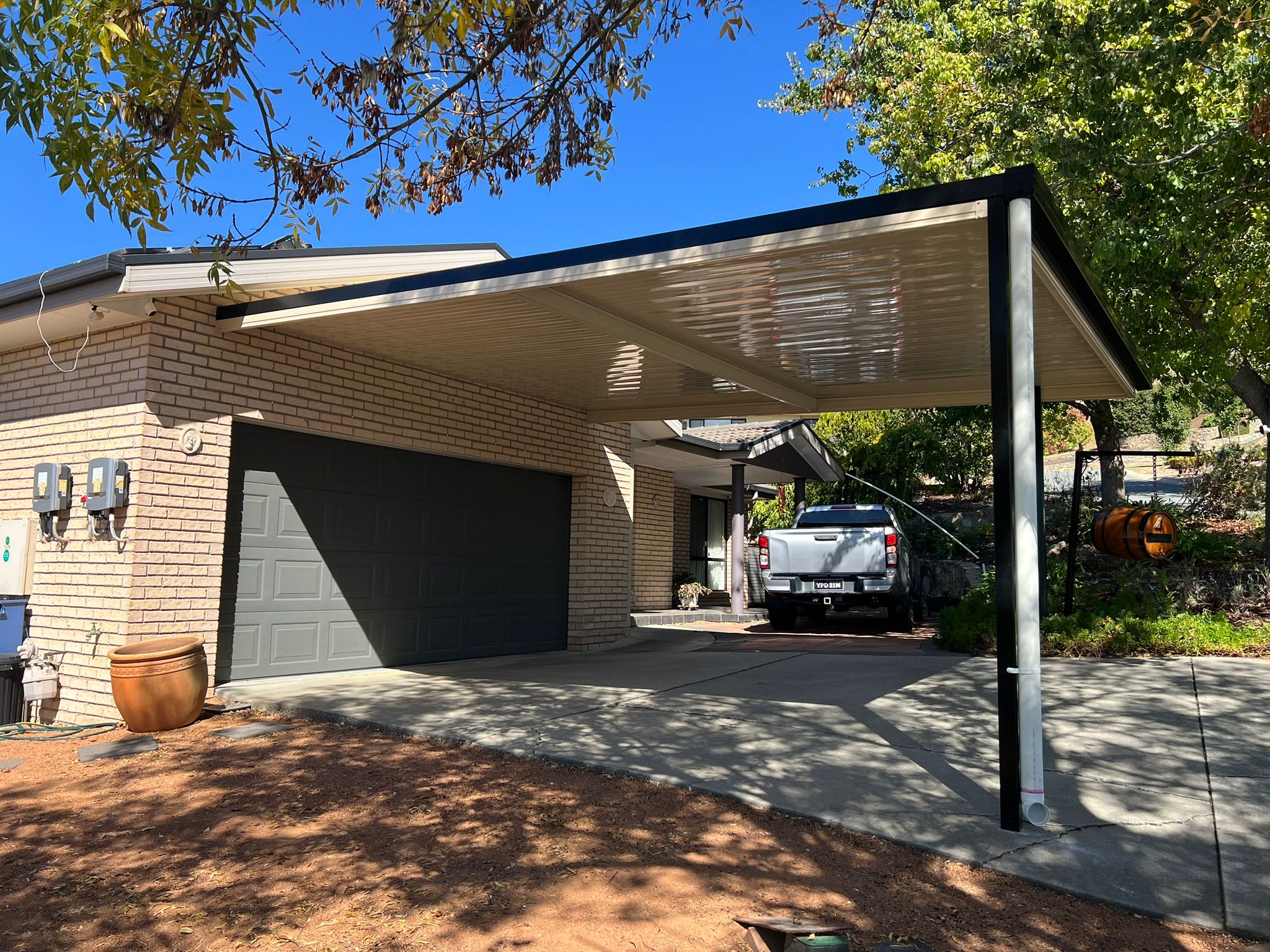 Single carport with Flatdeck roof attached to home, Gordon Canberra