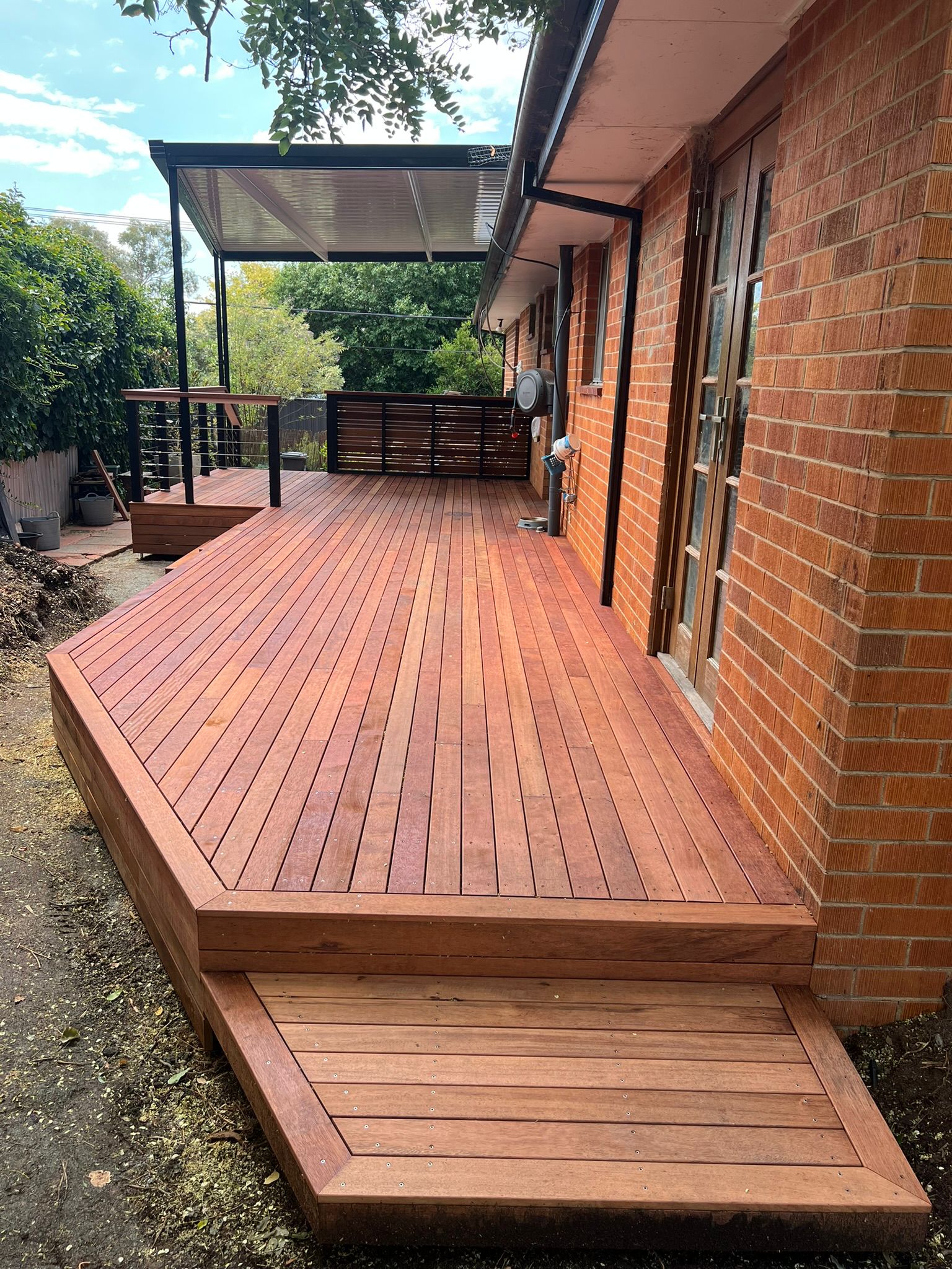 Merbau deck and cable balustrade alignment with home, Rivett Canberra