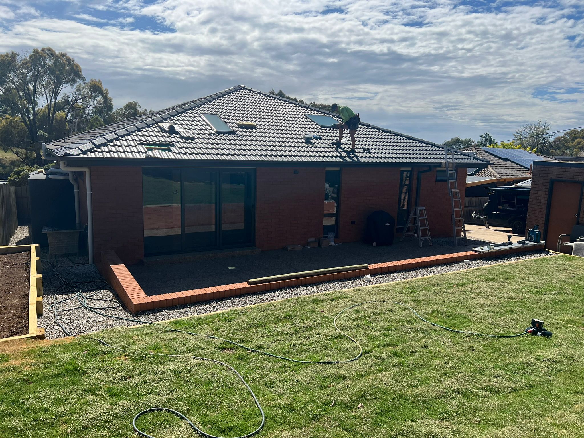 Flyover pergola with insulated roof panel attached to home, Spence Canberra